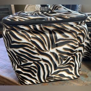 Lug Dolly bag in zebra print black and tan.